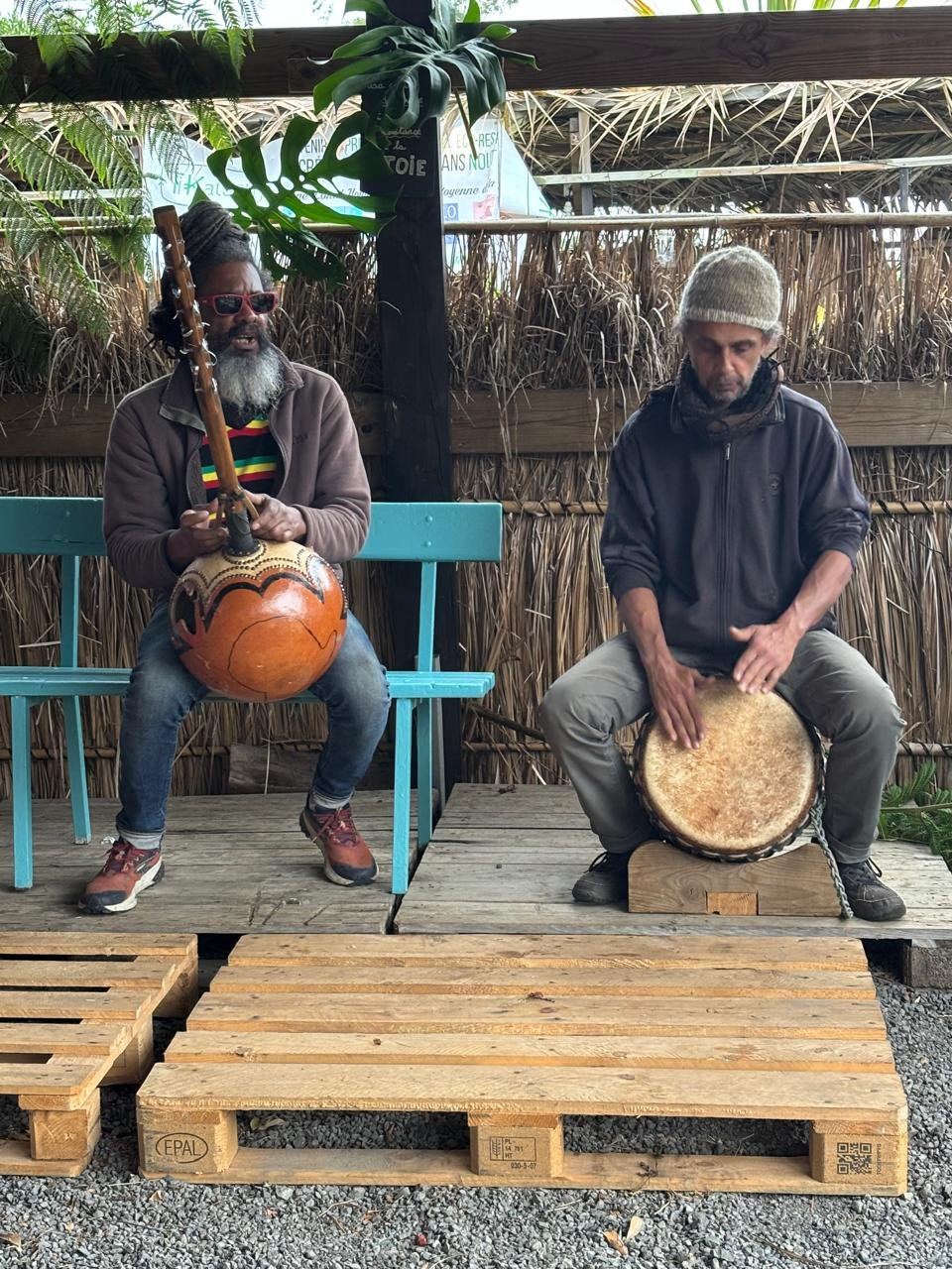 Musicians playing percussion at the market