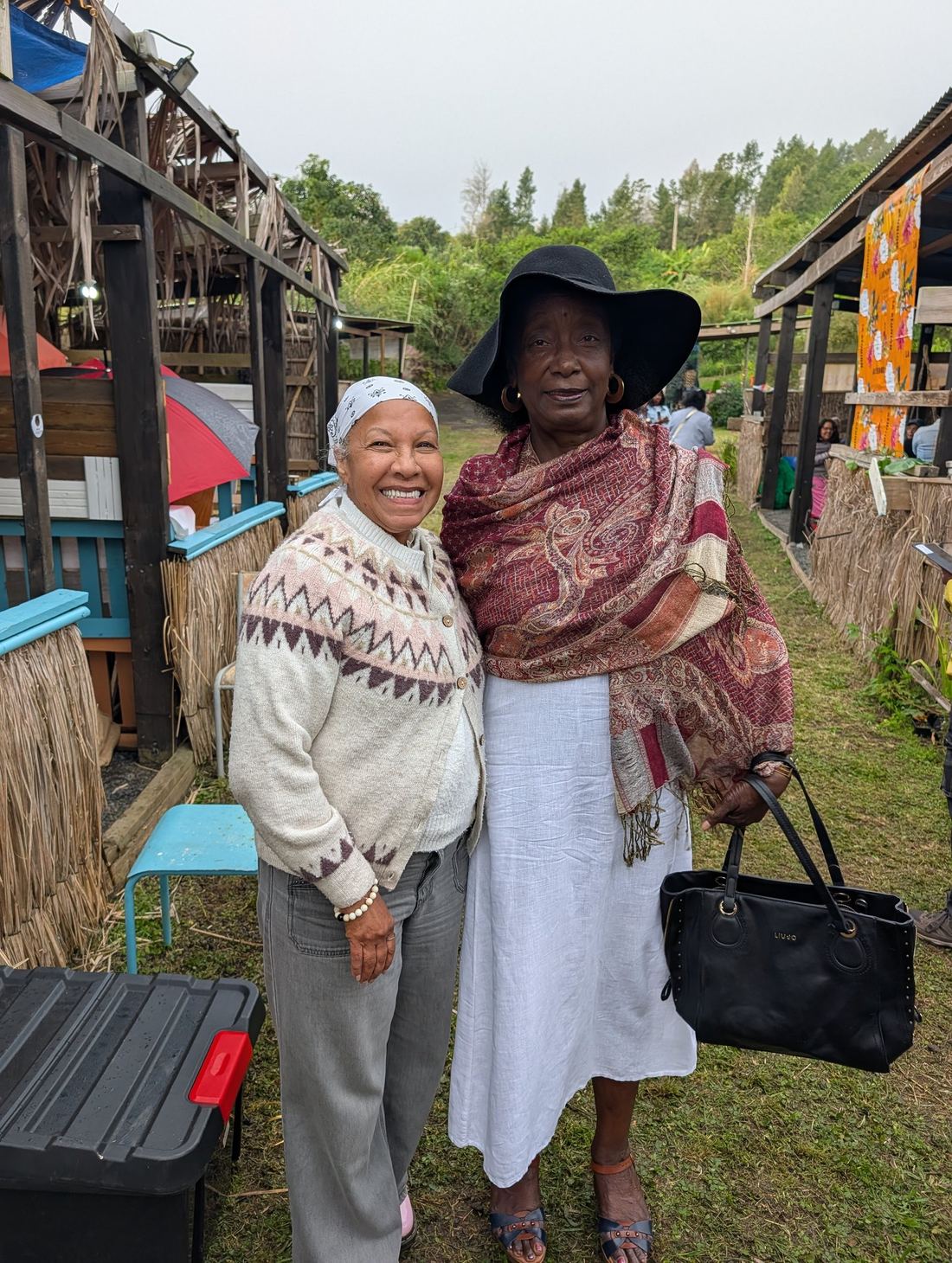 Two women embracing at the market — sisterhood