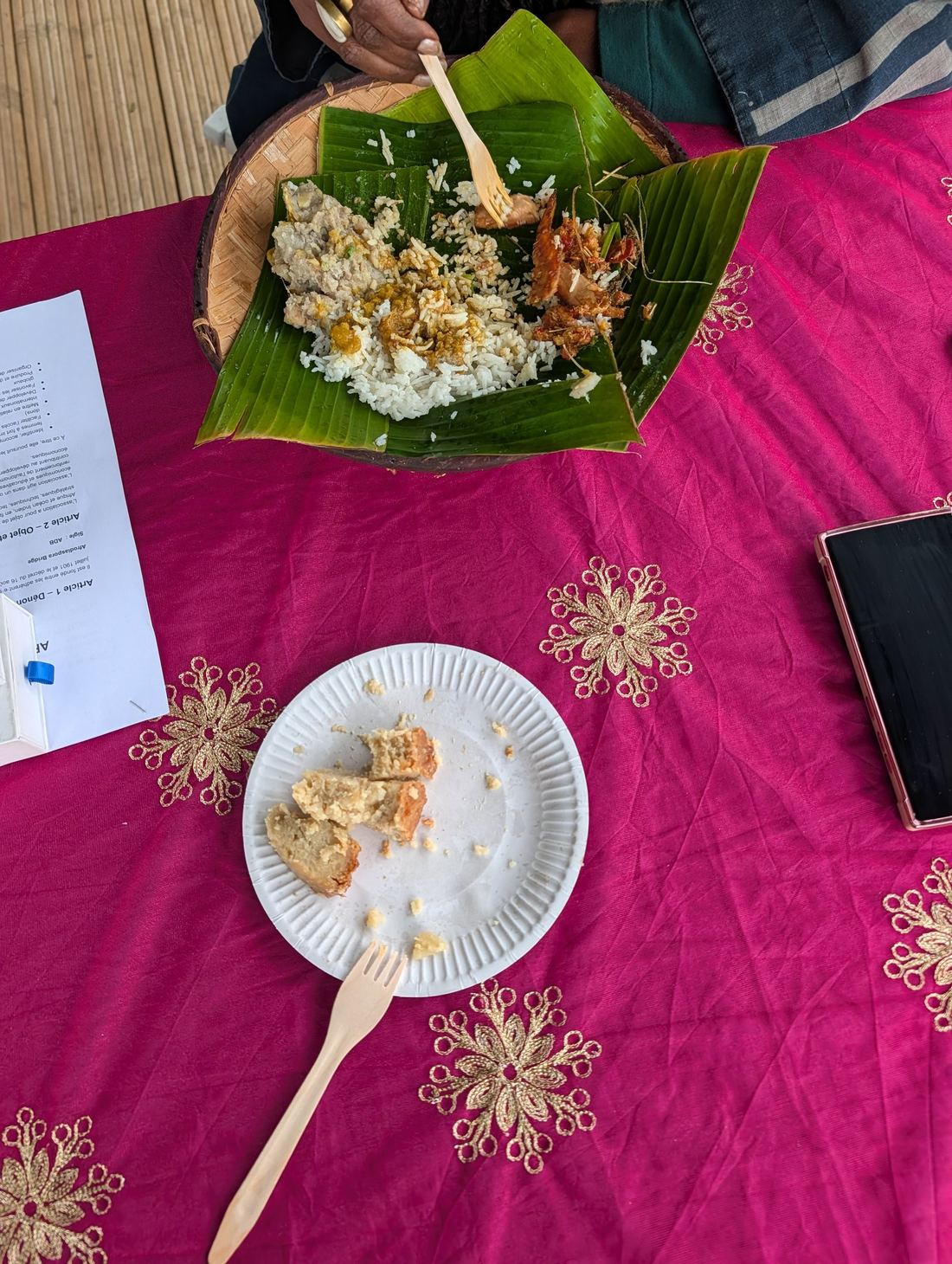Food shared on a banana leaf
