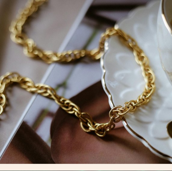 Gold chain jewellery — mood reference